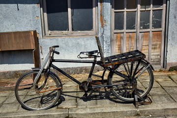 A very old black bike.
