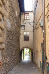 Typical narrow street in Arezzo, Tuscany, Italy.