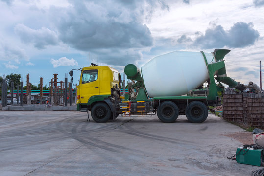 Cement truck is working on site, Is pouring concrete