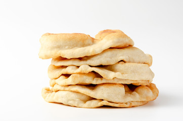 Navajo fried bread isolated on white background
