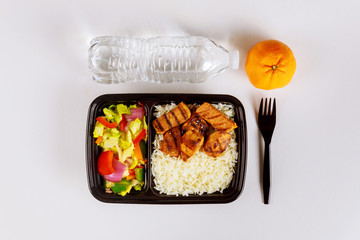Healthy food delivery or take away lunch in container.