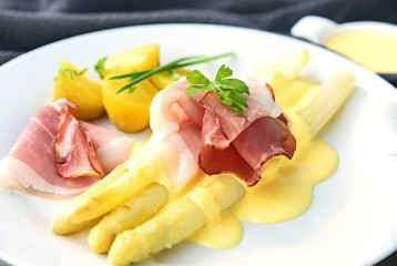 White Asparagus with Black Forest Ham and Hollandaise Sauce. Asparagus European menu.