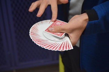 Red Playing Cards Skillfully Fanned in a Perfectly Circular Shape
