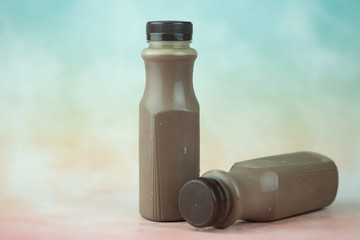 Tasty dark cocoa milk in plastic bottle