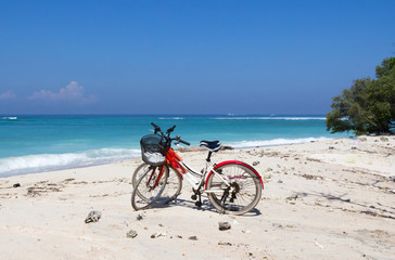 Fototapeta premium Bicycles on a white sand beach