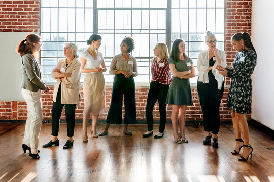 Diverse businesswomen networking