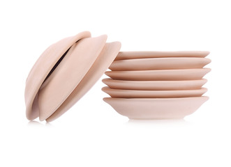 Simple clay bowl on white background. Traditional craft.