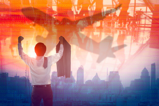 Businessman Raise The Hand With Aeroplane And City Background, Economic Restart After Pandemic Concept, Blurred Or Defocus Background