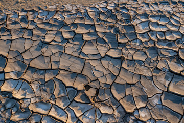 arid and cracked soil from the mud volcano