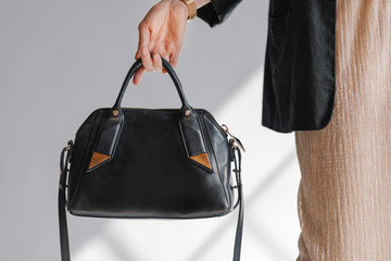 Black leather purse product shoot
