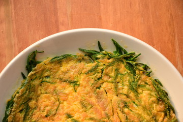 Cha-om khai or acacia omelette Thai food.