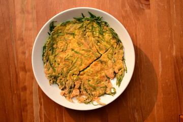 Cha-om khai or acacia omelette Thai food.