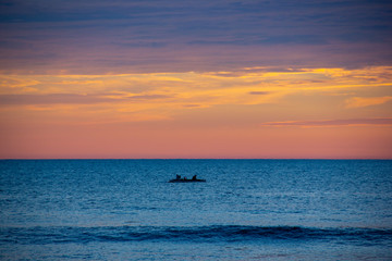 fishing boat at sunset