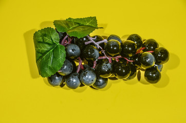 grapes with a yellow background
