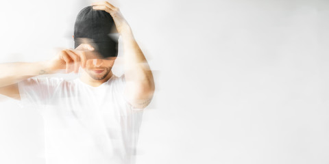 Man wearing a black cap