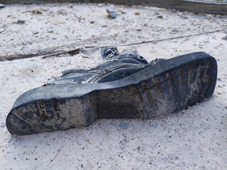 An old dirty rubber boot