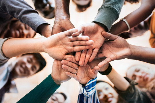 Group of people hands together