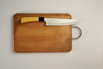 chopping board with kitchen knife
