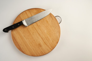 chopping board with kitchen knife