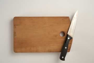 chopping board with kitchen knife