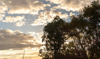 Obraz premium Rural landscape of the pampa biome and rain clouds at sunset in southern Brazil