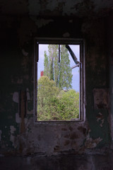Fototapeta na wymiar Interior of an abandoned railway station in Abkhazia