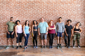 Happy people at the gym - Powered by Adobe