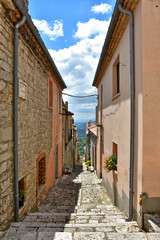 A small road between the old houses of Buonalbergo, a village in the province of Benevento