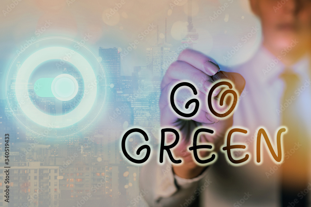 Aufkleber writing note showing go green. business concept for making more environmentally friendly decisions a