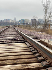 Fototapeta na wymiar city railroad tracks over lake