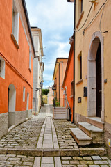 A small road between the old houses of Buonalbergo, a village in the province of Benevento