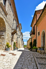 A small road between the old houses of Buonalbergo, a village in the province of Benevento