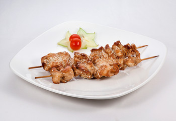 barbecue with vegetables on a white background