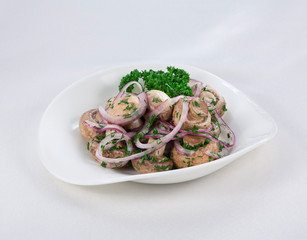 mushrooms with onions on a white background