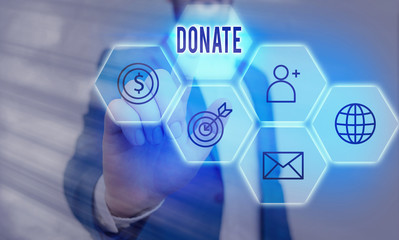 Handwriting text writing Donate. Conceptual photo give money or goods for good cause for example to...