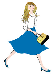 青いスカートを着た上を見上げて歩く女性