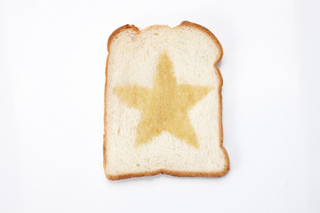 bread covered with butter or syrup in star shapes.