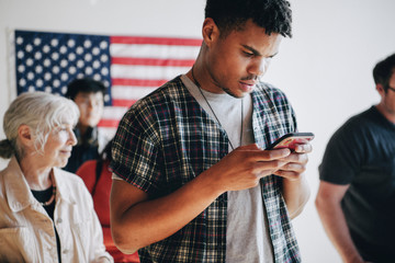 Young man online voting