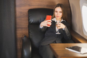 Attractive woman in private jet