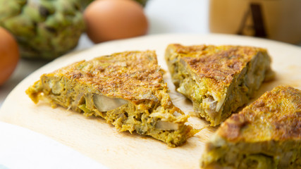 Spanish omelette traditional tapa with artichoke