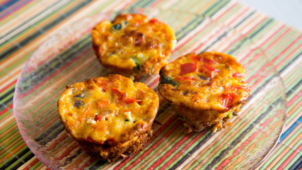 Salty muffins with egg and vegetables
