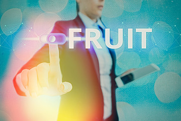 Conceptual hand writing showing Fruit. Concept meaning sweet and fleshy product of a tree or other...