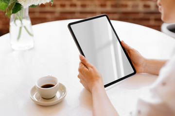 Woman using a digital tablet mockup