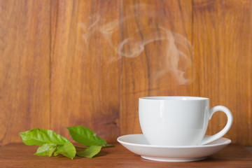 Coffee espresso on wood table nature background in garden,warm tone,rustic wood,