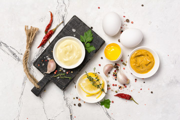 Homemade mayonnaise and ingredients for tasty and spicy food