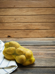 Potatoes in nylon mesh bag.