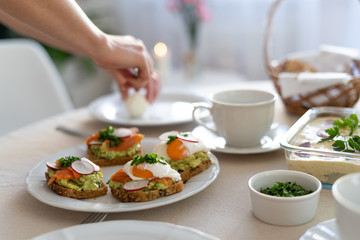 Festive Easter table setting with traditional meals. Easter breakfast in Poland. Christian tradition commemorating the resurrection of Jesus.