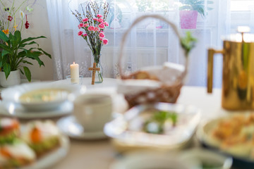 Festive Easter table setting with traditional meals. Easter breakfast in Poland. Christian tradition commemorating the resurrection of Jesus.