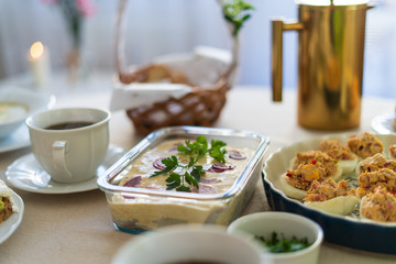 Festive Easter table setting with traditional meals. Easter breakfast in Poland. Christian tradition commemorating the resurrection of Jesus.
