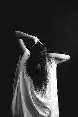 black and white studio photo of beautiful girl 